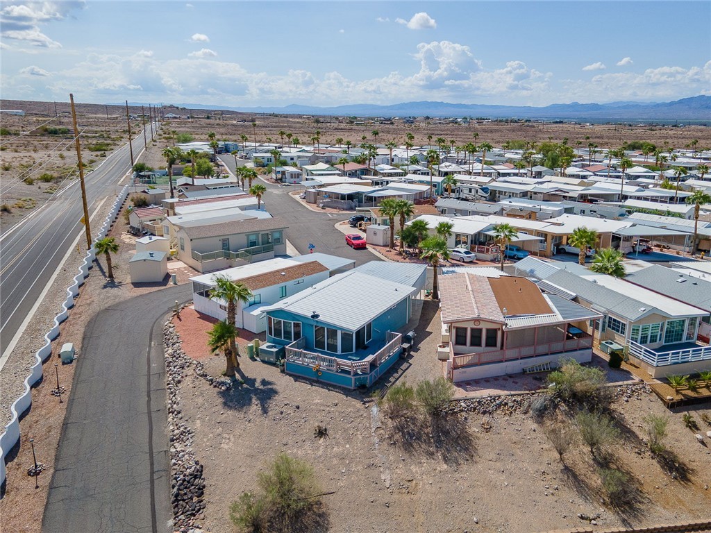 2000 Ramar Road, Unit 587 Bullhead City, AZ 86442 - Photo 59 of 79 Aerial view of residential area featuring a mountainous background