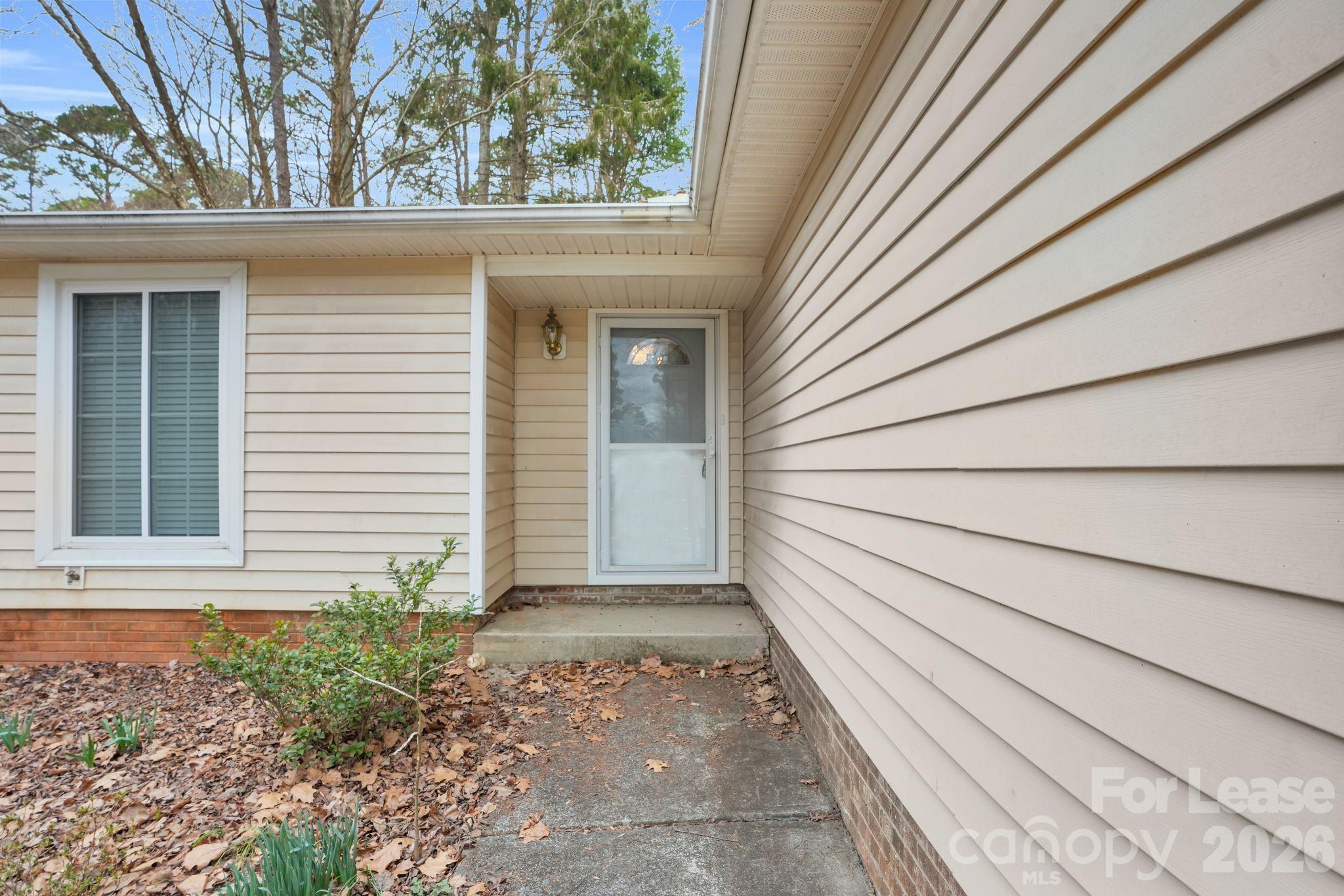 2427 Studley Road Charlotte, NC 28212 - Photo 5 of 30 a view of a house with a door and a window