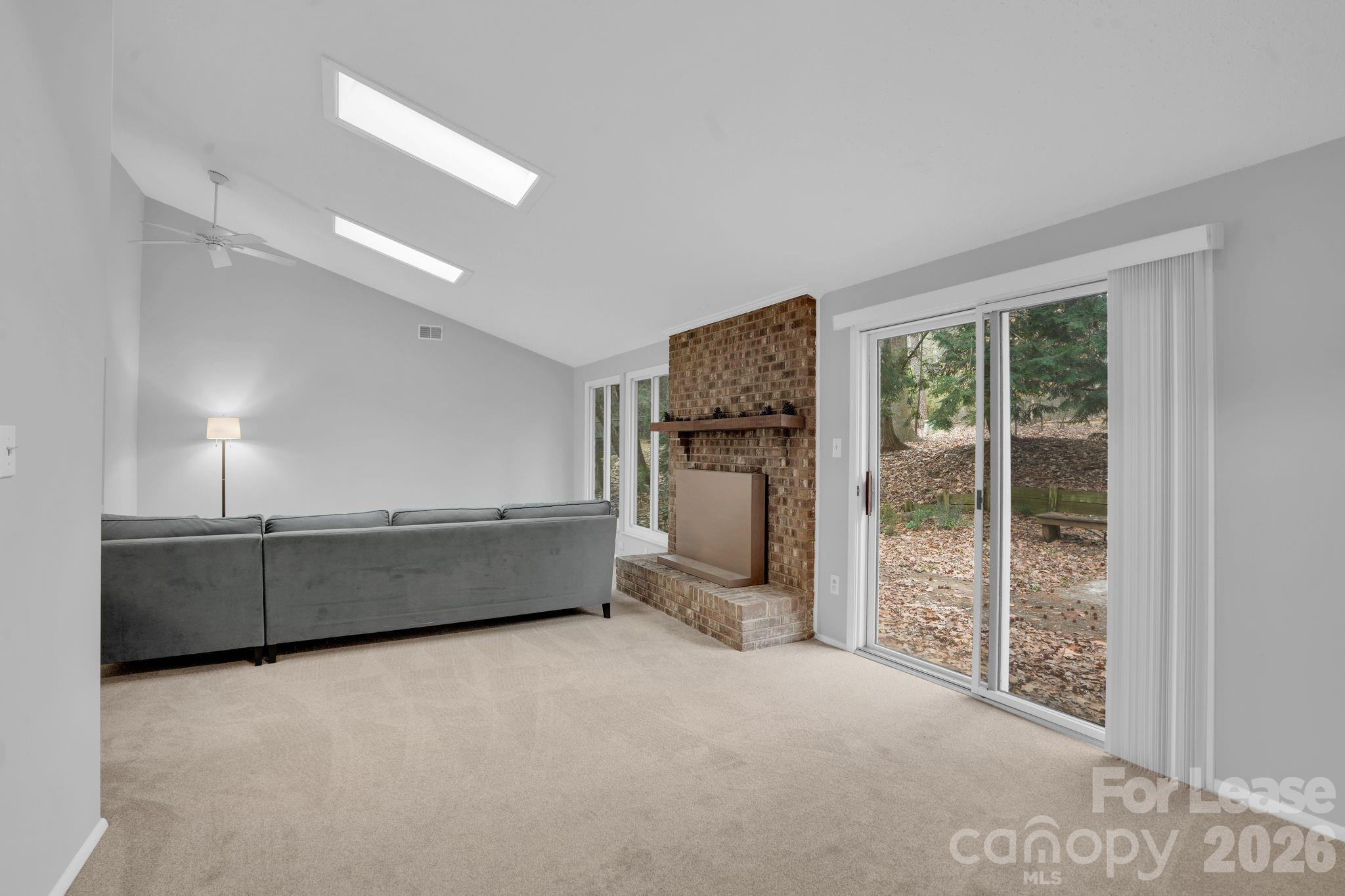 2427 Studley Road Charlotte, NC 28212 - Photo 10 of 30 a room with furniture and a gate