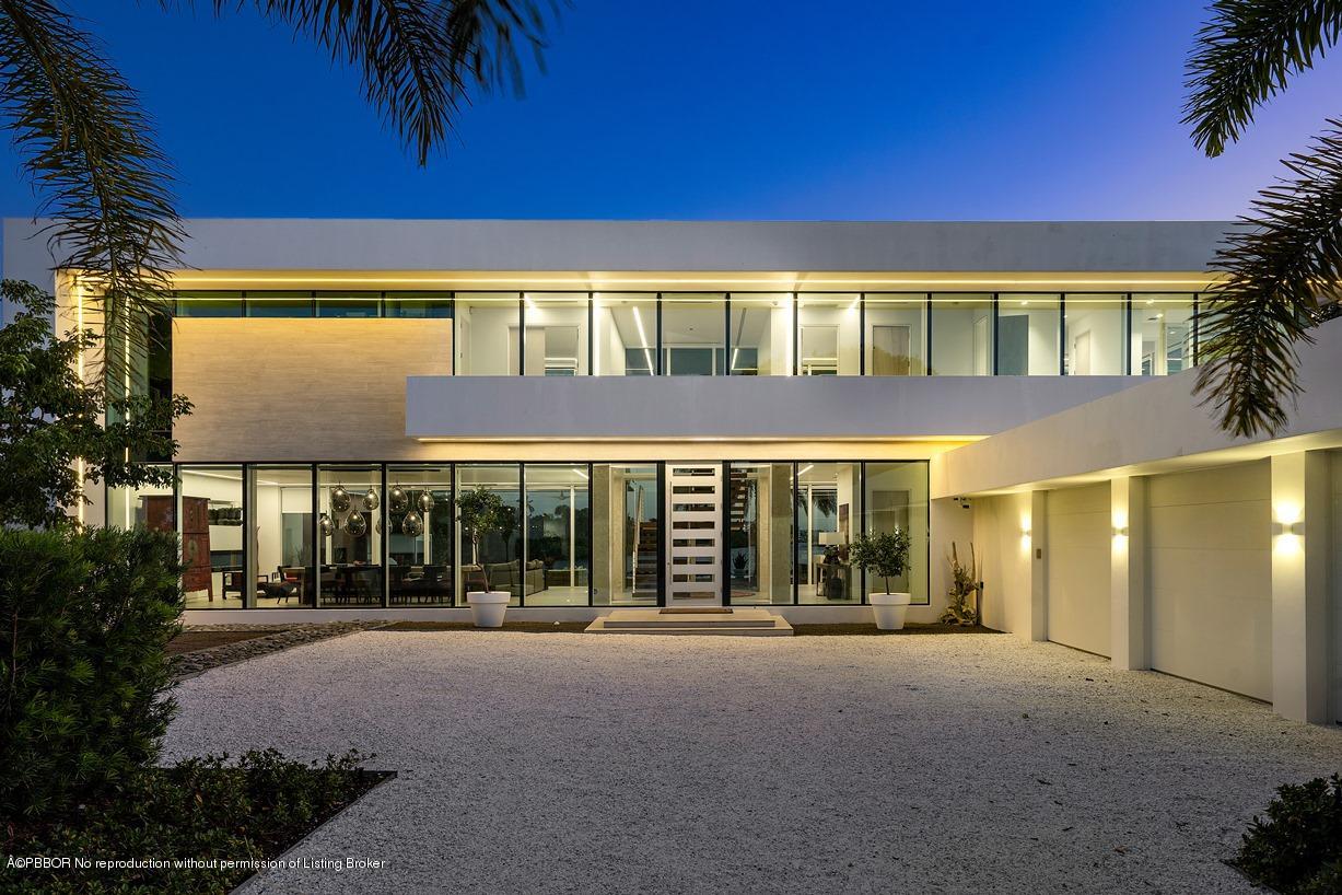 2299 Ibis Isle Road East Palm Beach, FL 33480 - Photo 11 of 37 front view of a building with a street