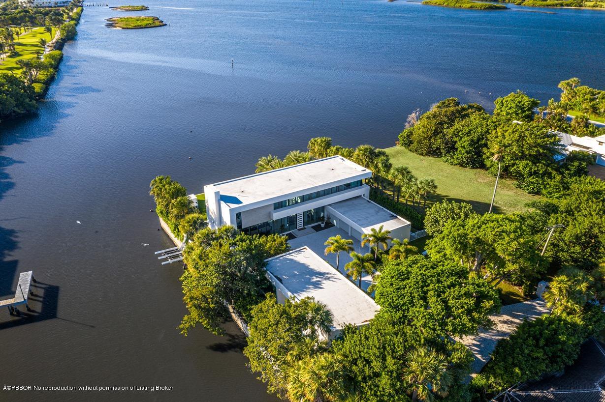2299 Ibis Isle Road East Palm Beach, FL 33480 - Photo 27 of 37 a picture of a table with chairs