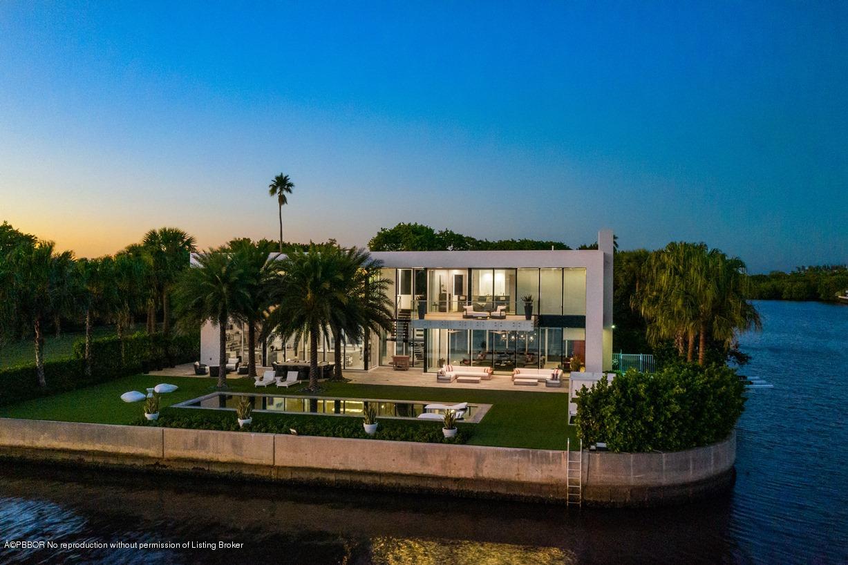 2299 Ibis Isle Road East Palm Beach, FL 33480 - Photo 4 of 37 a view of swimming pool from a balcony