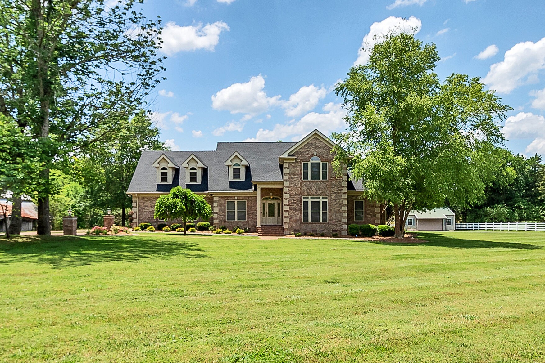 3555 Coble Road Lewisburg, TN 37091 - Photo 1 of 45 a front view of a house with a yard