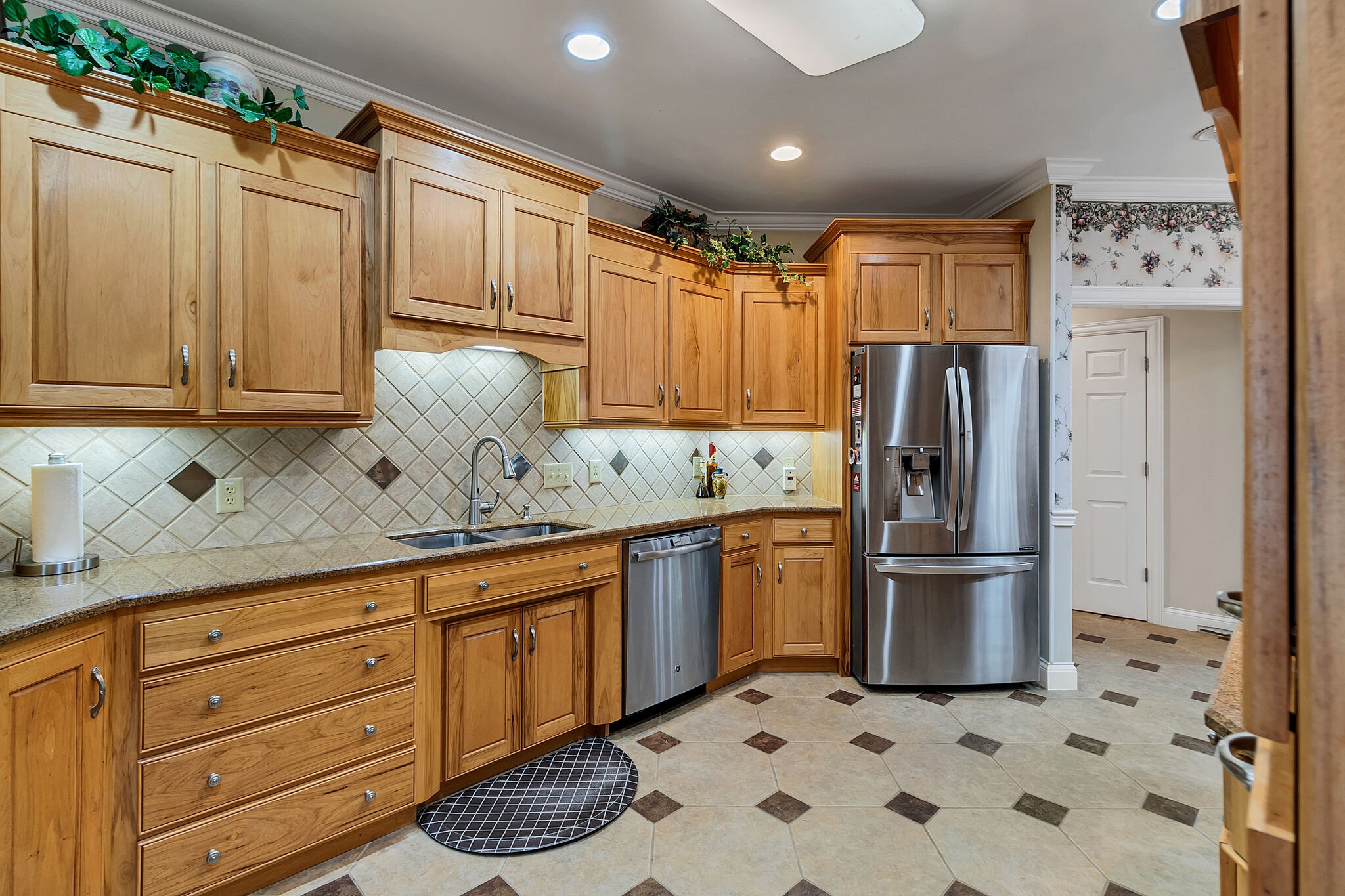3555 Coble Road Lewisburg, TN 37091 - Photo 13 of 45 a kitchen with stainless steel appliances granite countertop a refrigerator sink and cabinets