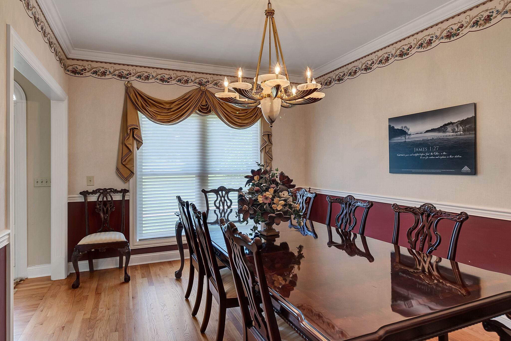3555 Coble Road Lewisburg, TN 37091 - Photo 15 of 45 a view of a dining room with furniture a chandelier and wooden floor