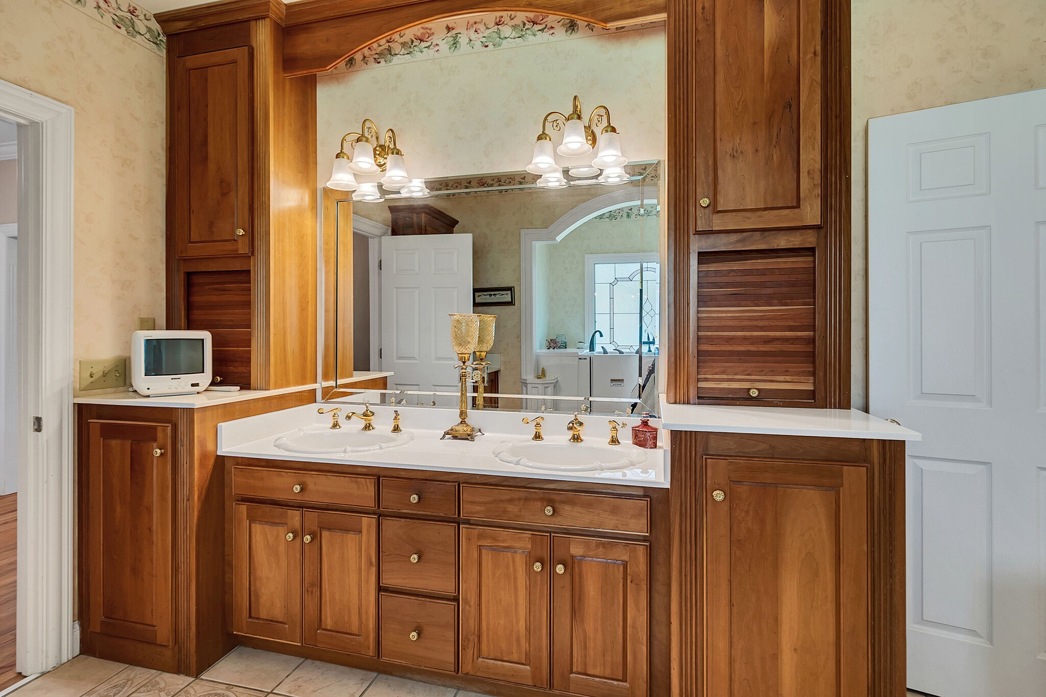 3555 Coble Road Lewisburg, TN 37091 - Photo 20 of 45 a bathroom with a double vanity sink and a mirror