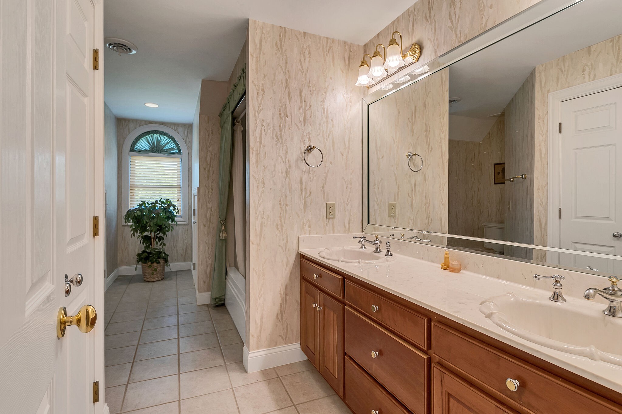 3555 Coble Road Lewisburg, TN 37091 - Photo 30 of 45 a bathroom with a double vanity sink and a mirror