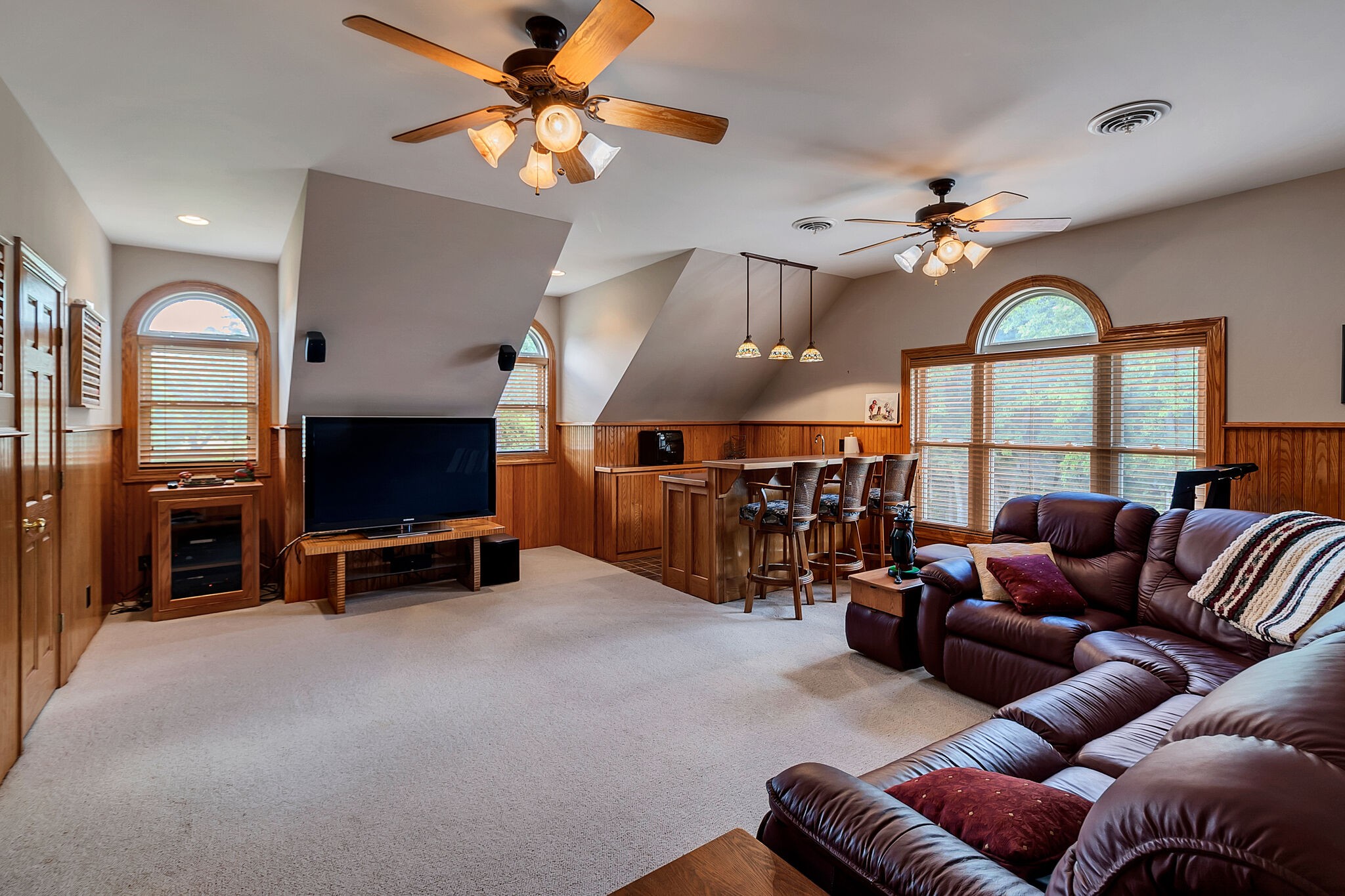 3555 Coble Road Lewisburg, TN 37091 - Photo 33 of 45 a living room with furniture a ceiling fan and a flat screen tv