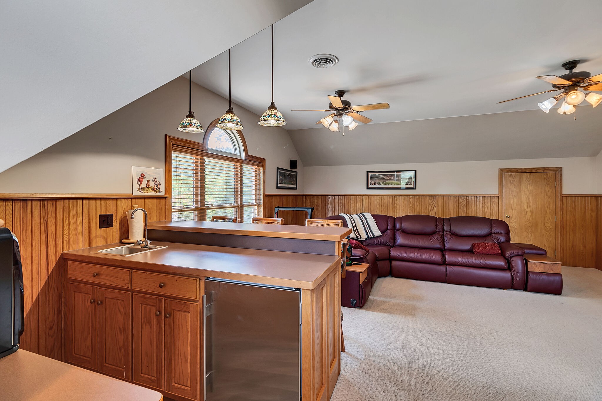 3555 Coble Road Lewisburg, TN 37091 - Photo 35 of 45 a living room with furniture a chandelier and a flat screen tv