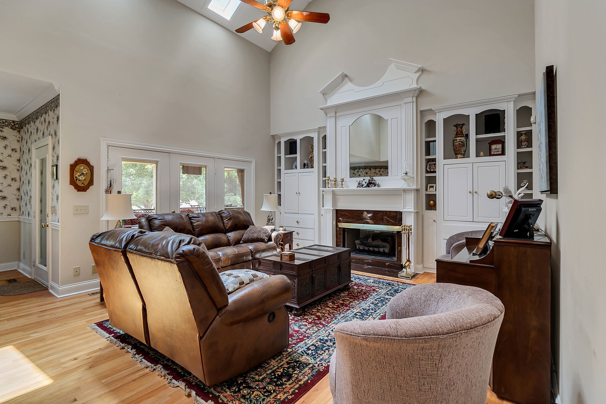 3555 Coble Road Lewisburg, TN 37091 - Photo 8 of 45 a living room with furniture a fireplace and a flat screen tv