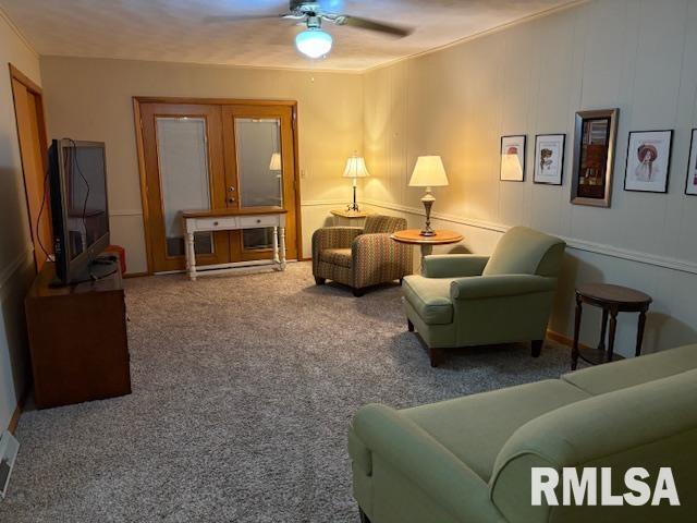 15614 63rd Street Milan, IL 61264 - Photo 15 of 25 a living room with furniture and a flat screen tv