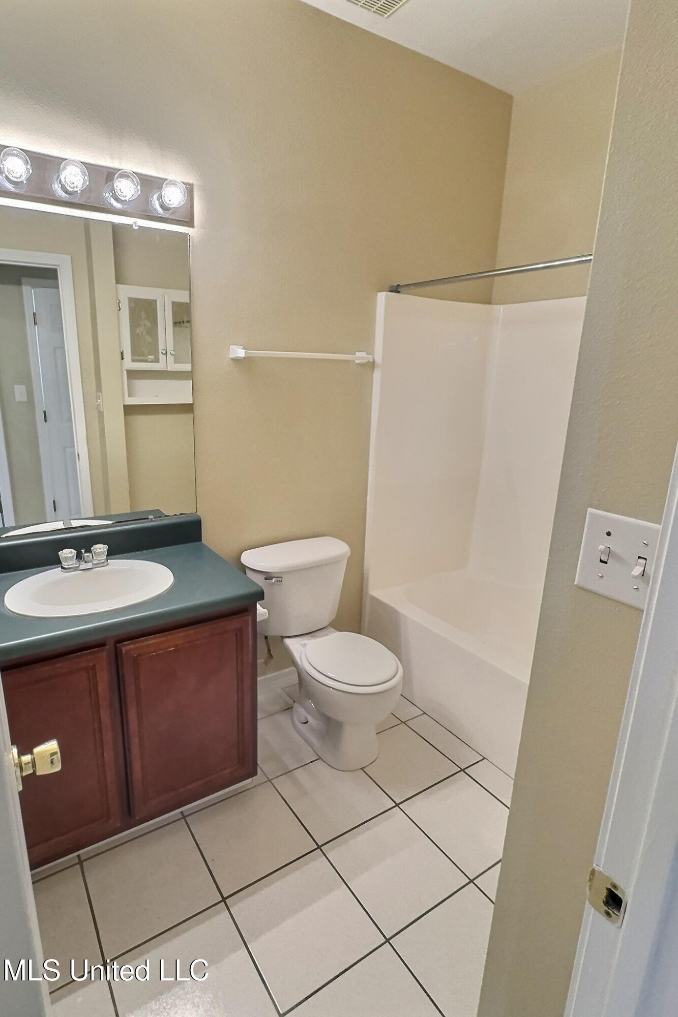 8018 Exchange Street, Unit B Gautier, MS 39553 - Photo 12 of 16 exposio_132603913