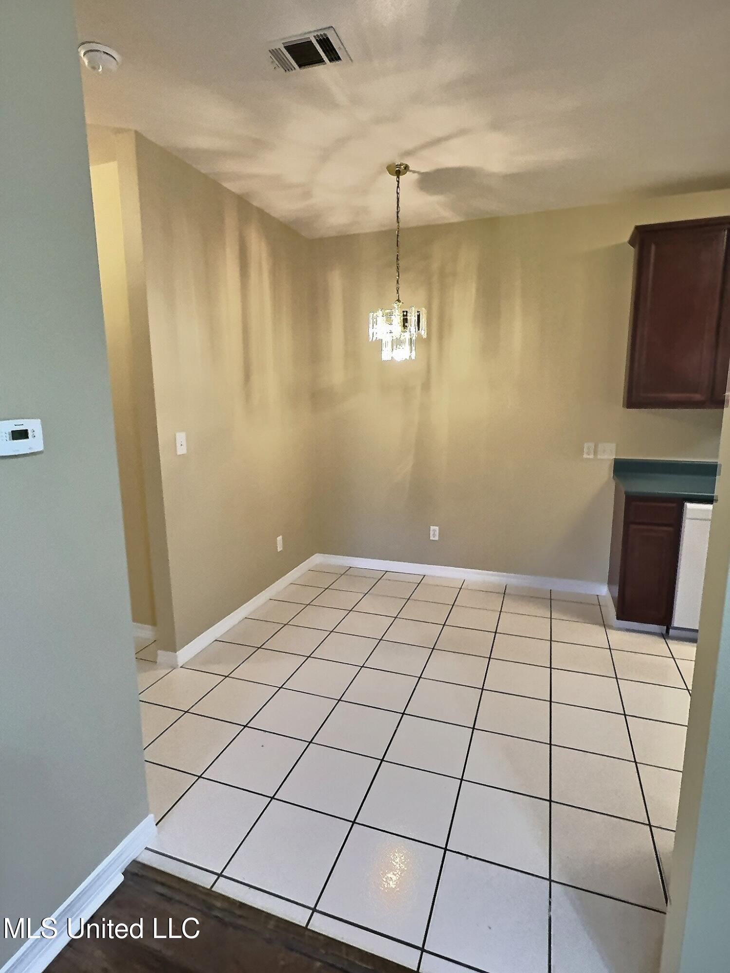 8018 Exchange Street, Unit B Gautier, MS 39553 - Photo 4 of 16 exposio_132603873