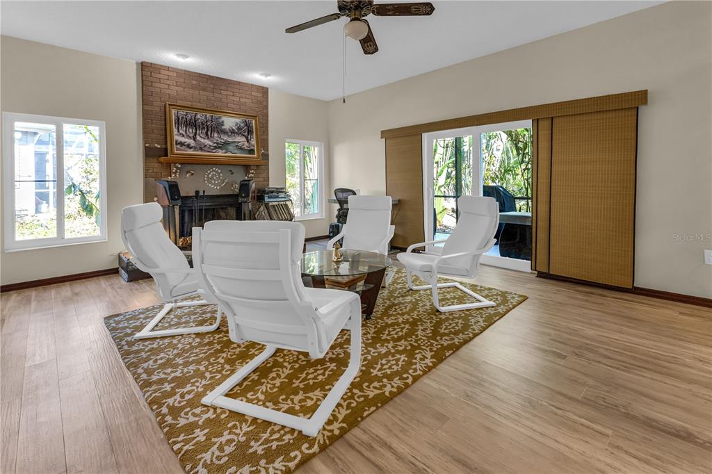 1035 Sirus Trail Sarasota, FL 34232 - Photo 17 of 48 a living room with furniture and a flat screen tv
