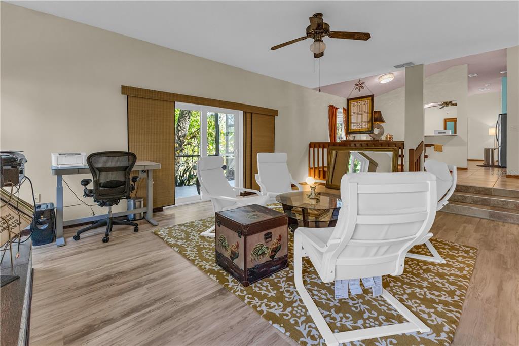 1035 Sirus Trail Sarasota, FL 34232 - Photo 18 of 48 a living room with furniture and a window