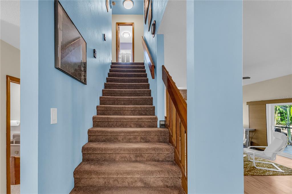 1035 Sirus Trail Sarasota, FL 34232 - Photo 8 of 48 a view of entryway and hall with wooden floor