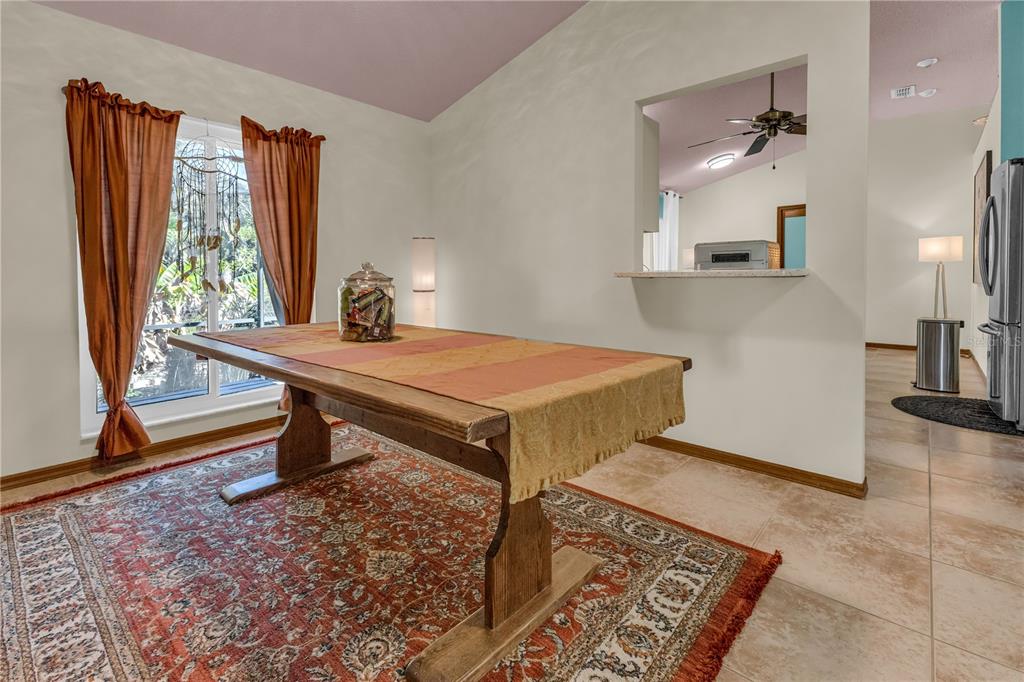 1035 Sirus Trail Sarasota, FL 34232 - Photo 9 of 48 a room with pool table and windows