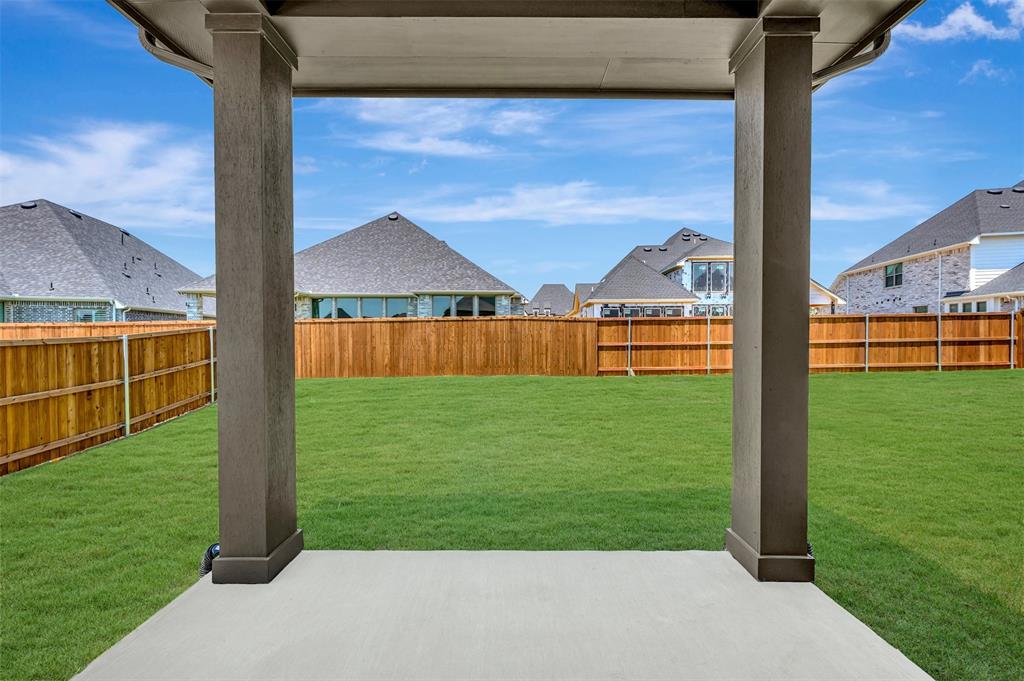 4308 Palomino Road Aubrey, TX 76227 - Photo 5 of 40 a view of a back yard
