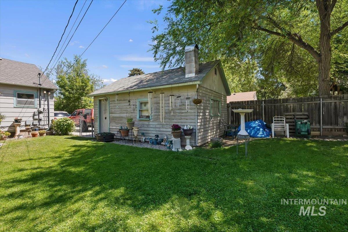 4619 Freemont Street Boise, ID 83706 - Photo 20 of 27 Detached auxiliary building with horizontal wood siding and a gabled roof