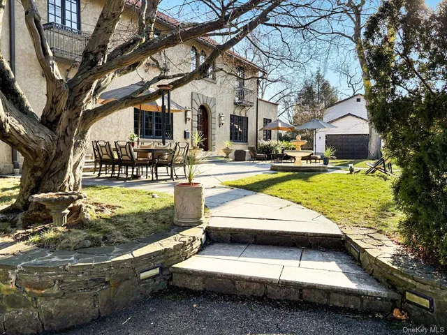 a view of swimming pool with patio