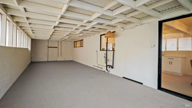 a view of a room with an empty space