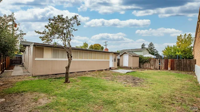 a house view with a garden space