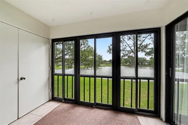 a view of a room with large windows