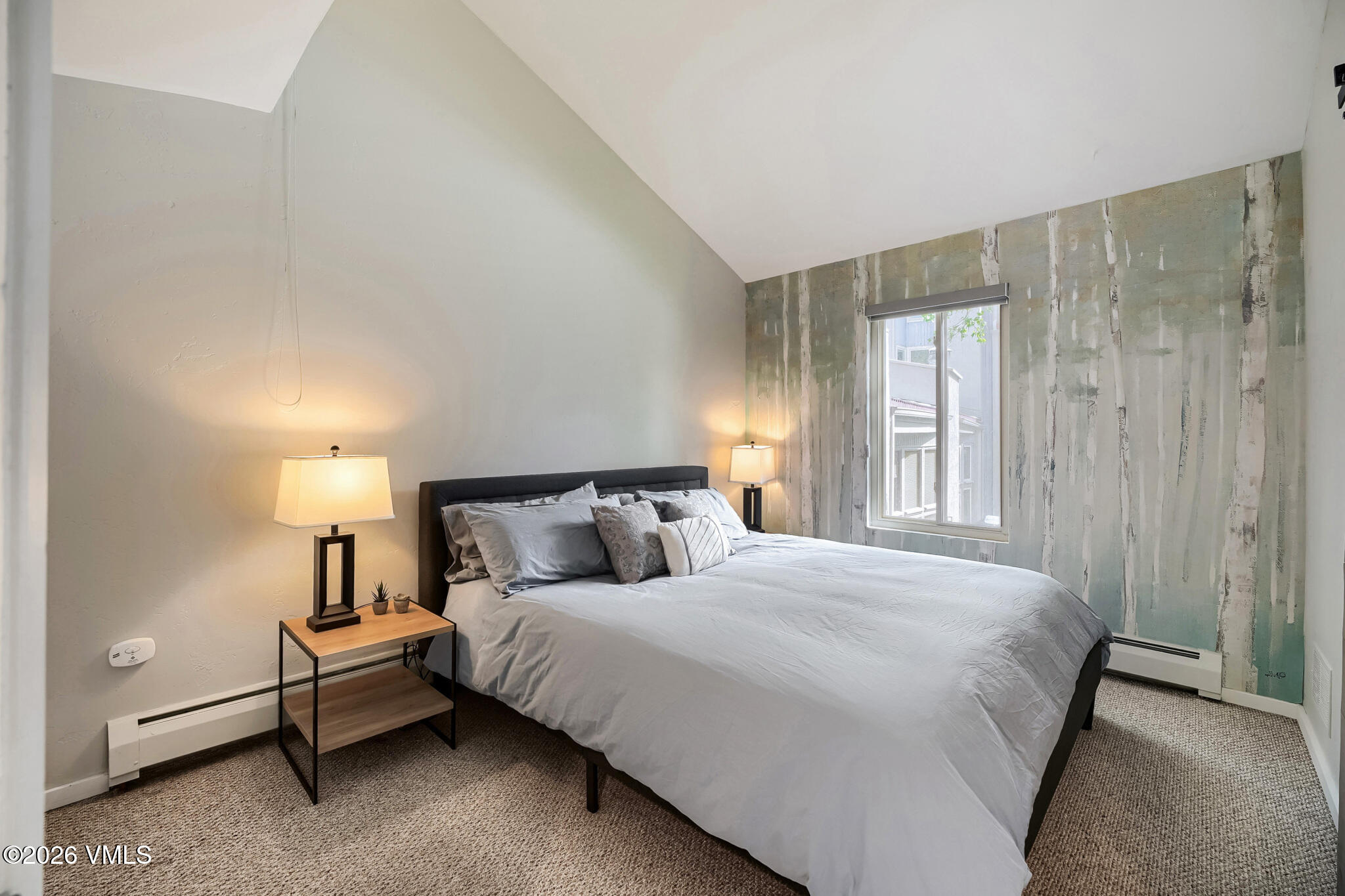 142 Eagle Drive, Unit C1 Avon, CO 81620 - Photo 11 of 20 a bedroom with a bed and a night stand