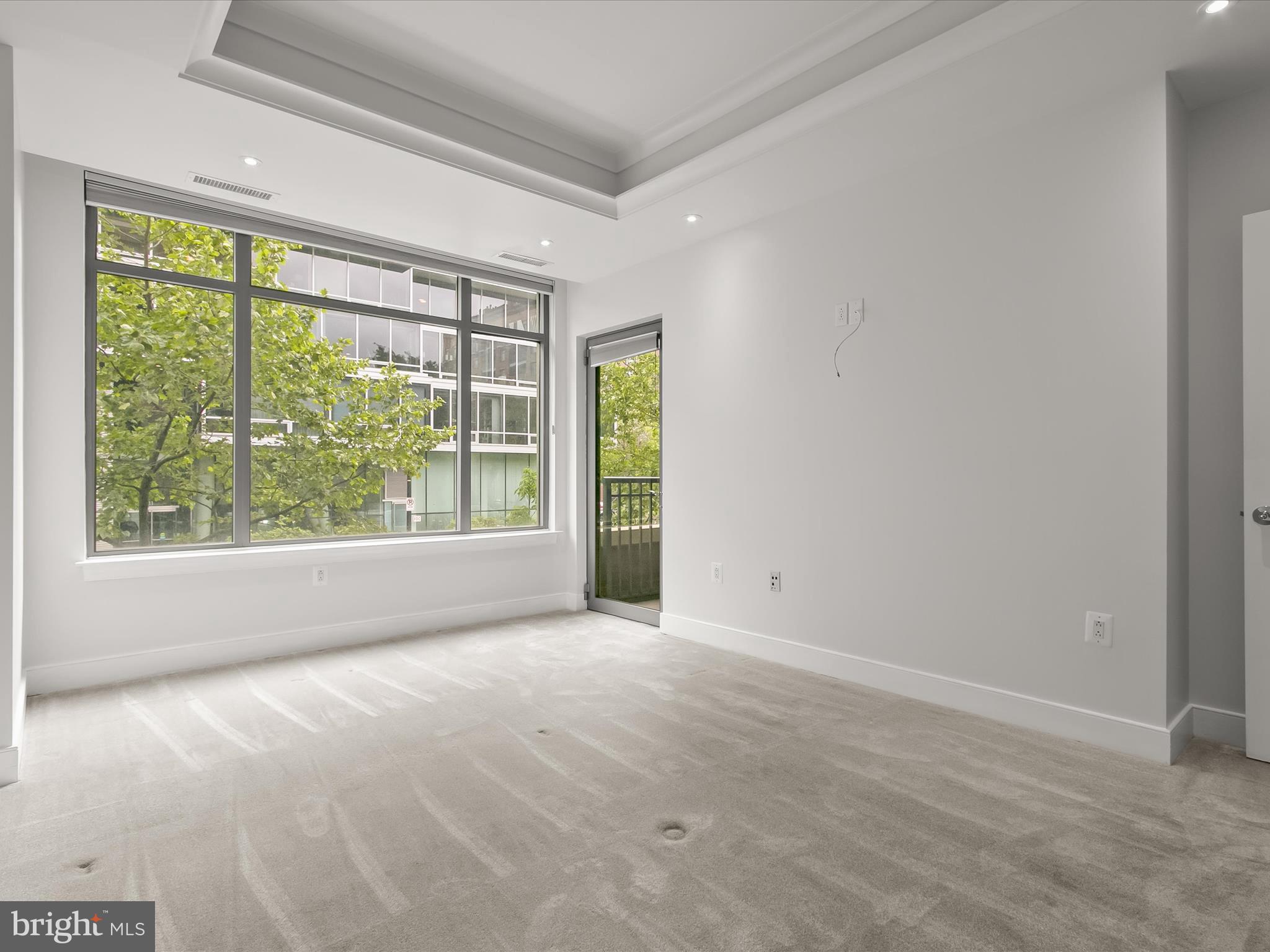 2425 L Street Northwest, Unit 239 Washington, DC 20037 - Photo 15 of 43 a view of an empty room with a window