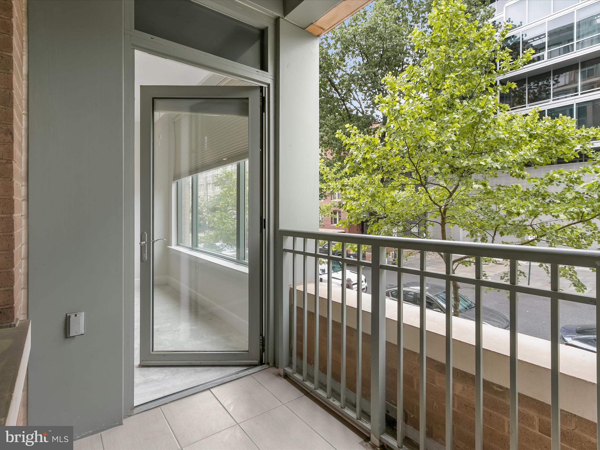 2425 L Street Northwest, Unit 239 Washington, DC 20037 - Photo 16 of 43 a view of a glass door and a window