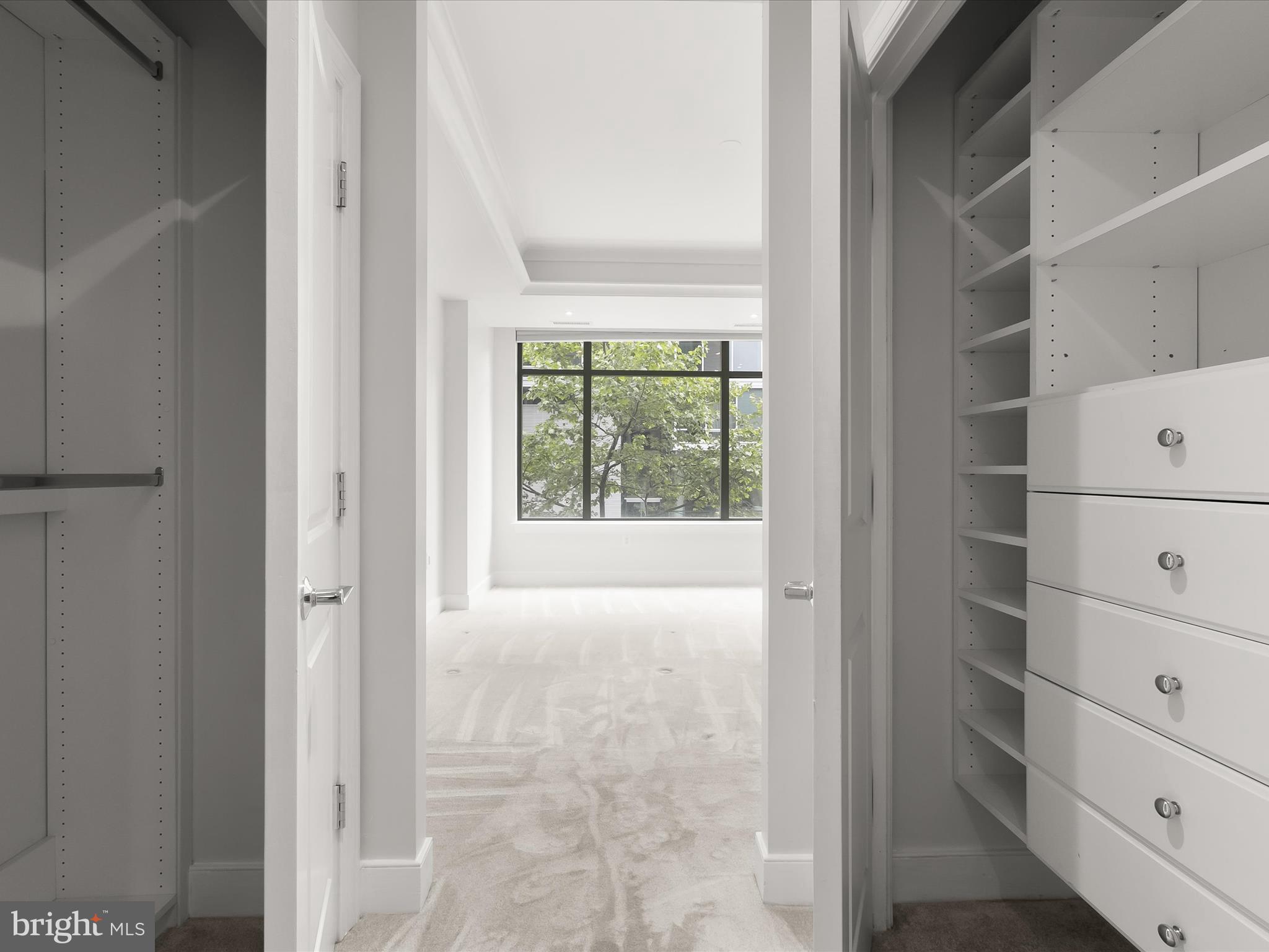 2425 L Street Northwest, Unit 239 Washington, DC 20037 - Photo 20 of 43 a view of an empty room with a window