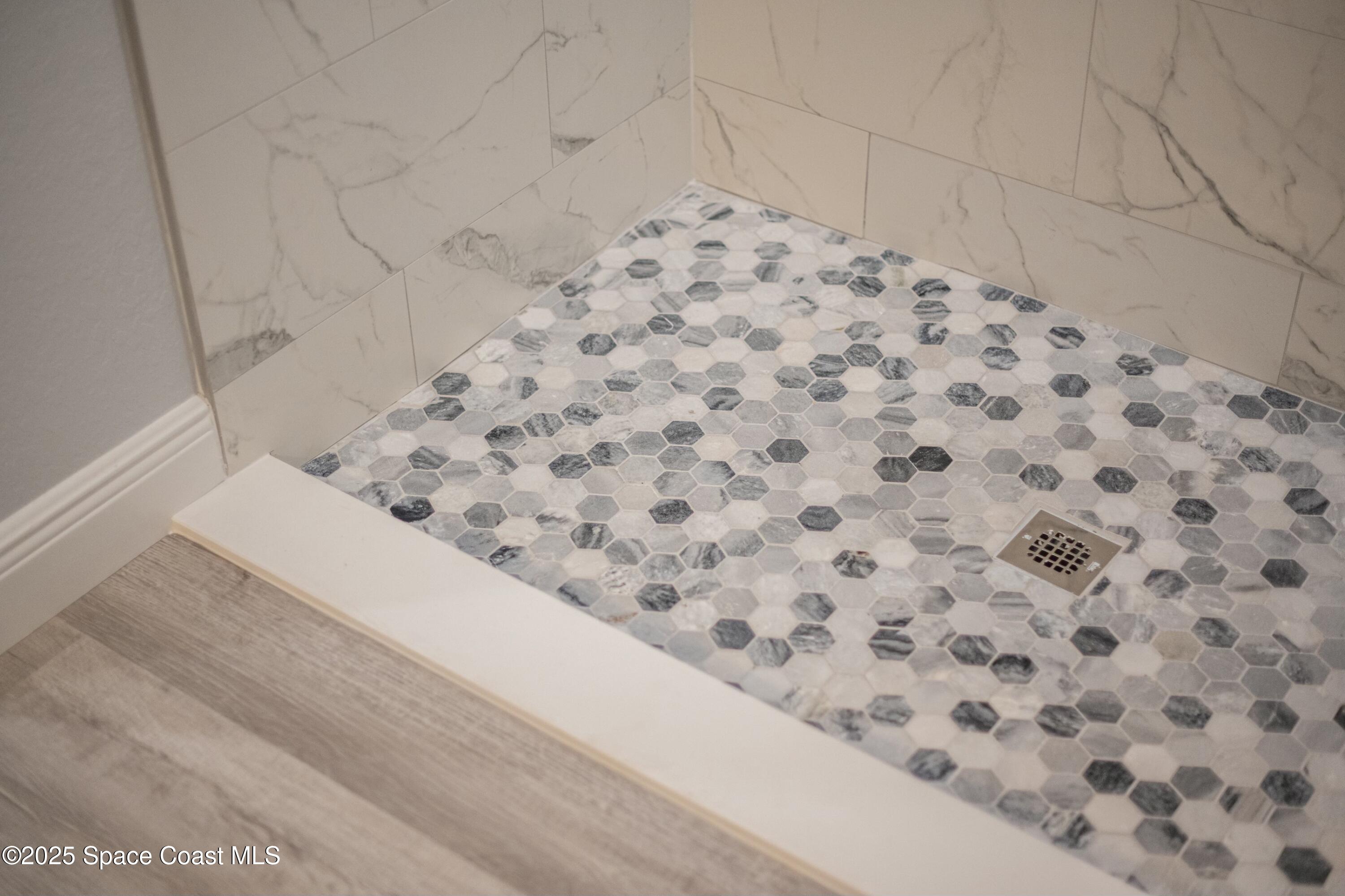 1341 Defender Street Northwest Palm Bay, FL 32907 - Photo 28 of 38 a view of a bathtub