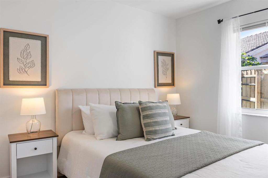 8330 Bermuda Sound Way Boynton Beach, FL 33436 - Photo 11 of 52 a bedroom with a bed and a lamp on dresser