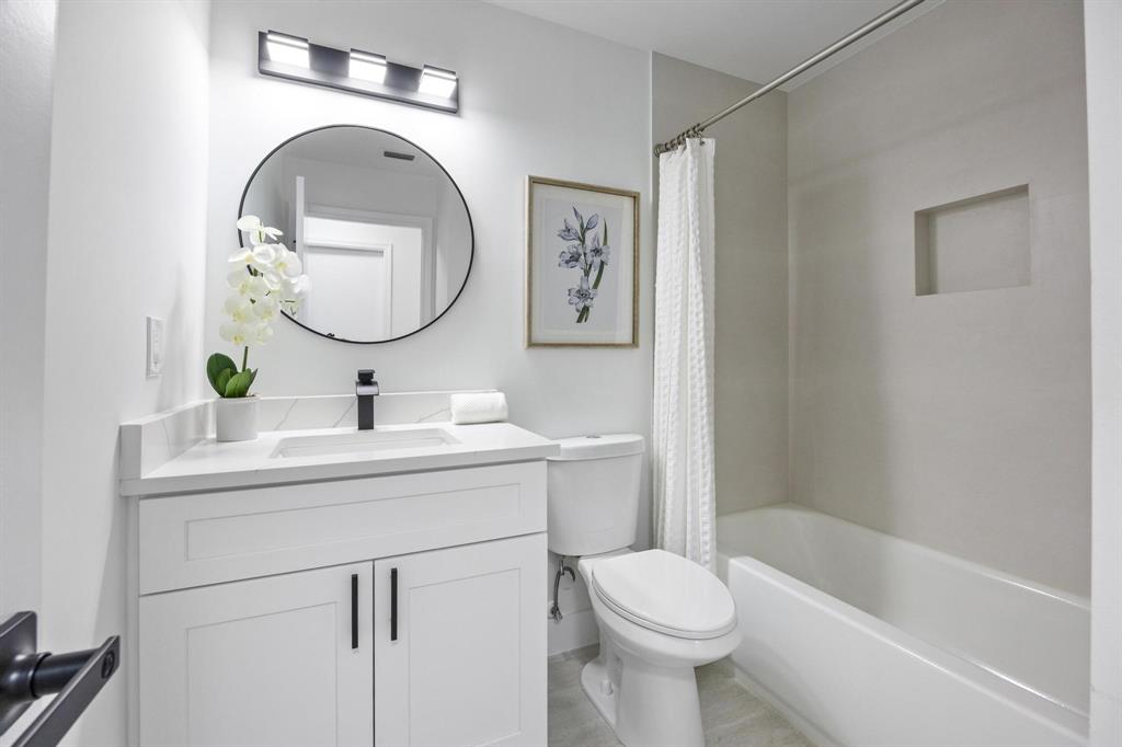 8330 Bermuda Sound Way Boynton Beach, FL 33436 - Photo 12 of 52 a bathroom with a toilet sink and mirror