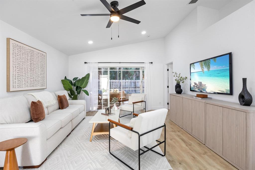 8330 Bermuda Sound Way Boynton Beach, FL 33436 - Photo 16 of 52 a living room with furniture and a flat screen tv