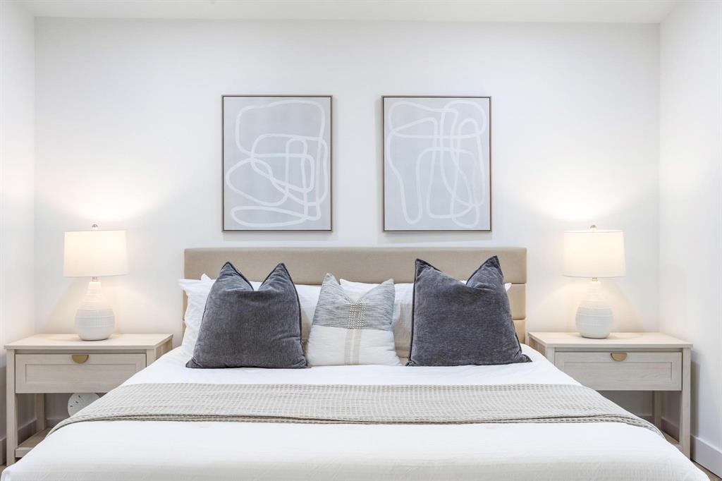 8330 Bermuda Sound Way Boynton Beach, FL 33436 - Photo 21 of 52 a white bed sitting in a bedroom next to a window with potted plant