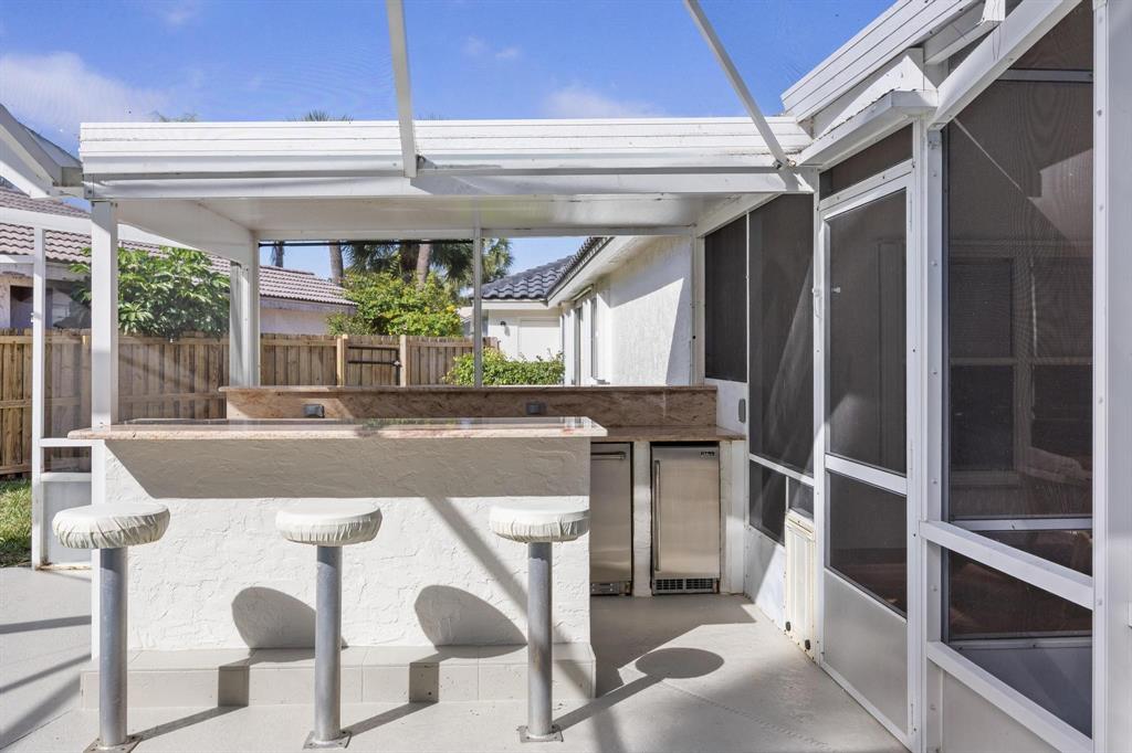 8330 Bermuda Sound Way Boynton Beach, FL 33436 - Photo 29 of 52 a view of kitchen with furniture and large windows
