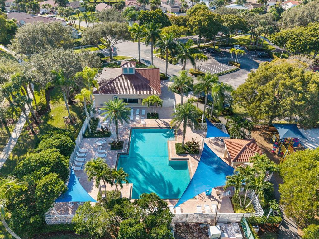 8330 Bermuda Sound Way Boynton Beach, FL 33436 - Photo 32 of 52 an aerial view of residential houses with outdoor space and trees all around