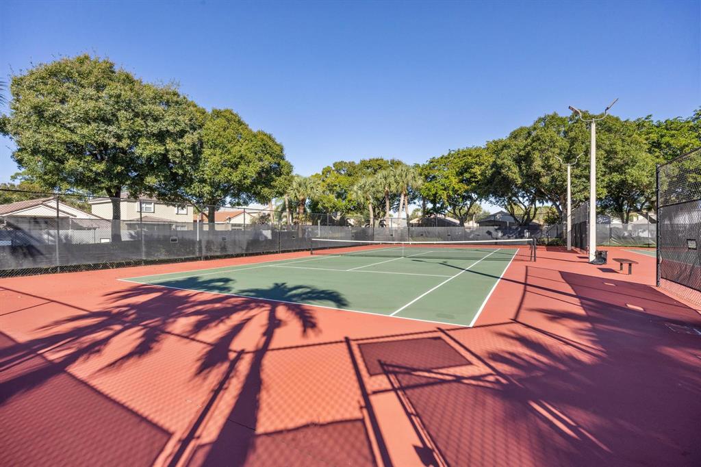 8330 Bermuda Sound Way Boynton Beach, FL 33436 - Photo 34 of 52 a view of backyard with swimming pool and green space