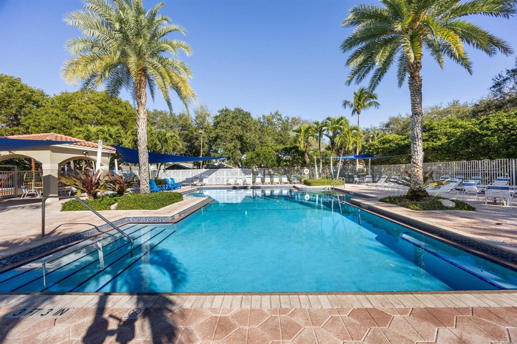 8330 Bermuda Sound Way Boynton Beach, FL 33436 - Photo 35 of 52 a view of a swimming pool with a patio