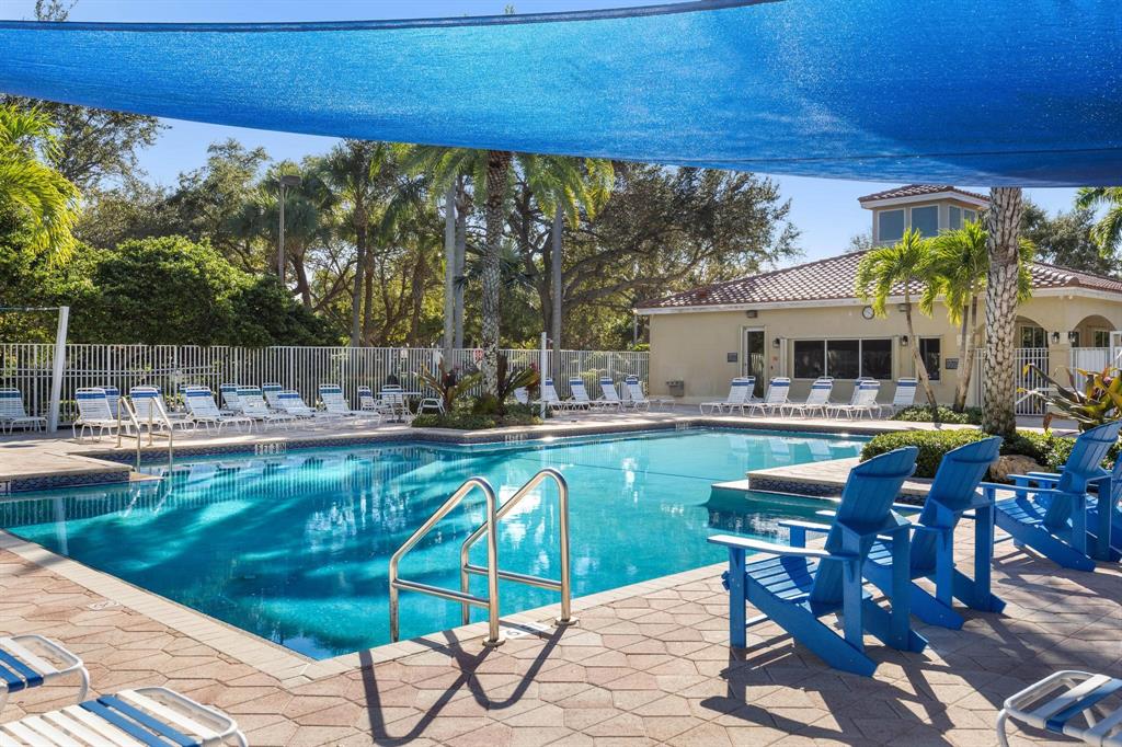 8330 Bermuda Sound Way Boynton Beach, FL 33436 - Photo 37 of 52 a view of swimming pool with outdoor seating and plants