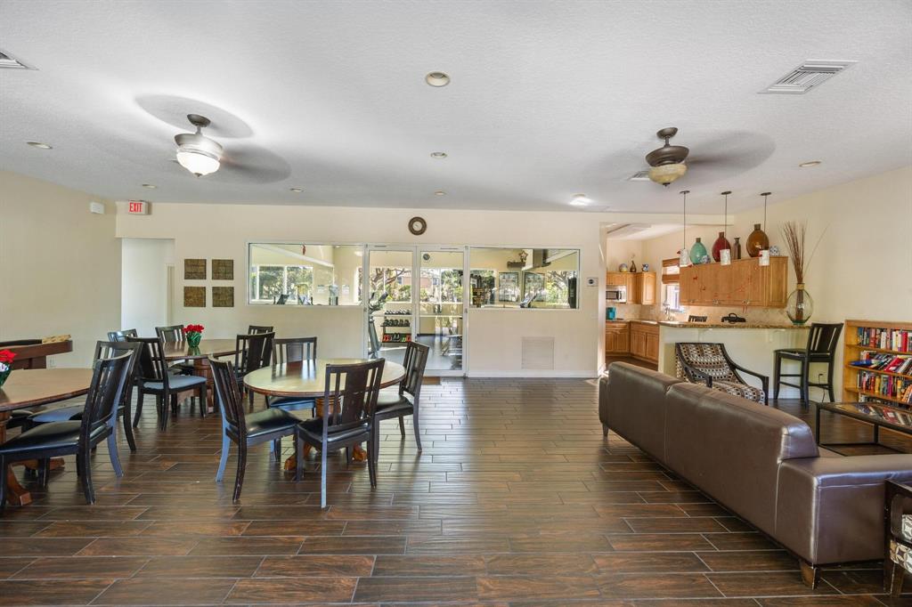 8330 Bermuda Sound Way Boynton Beach, FL 33436 - Photo 39 of 52 a view of a dining room with furniture