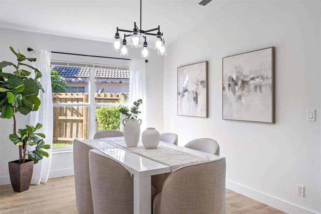 8330 Bermuda Sound Way Boynton Beach, FL 33436 - Photo 5 of 52 a dining room with furniture and window