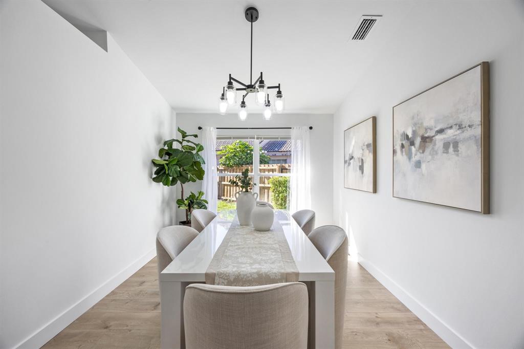 8330 Bermuda Sound Way Boynton Beach, FL 33436 - Photo 6 of 52 a dining room with furniture and window
