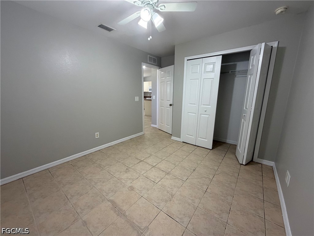 4535 26th Street Southwest Lehigh Acres, FL 33973 - Photo 14 of 14 an empty room with a bathroom