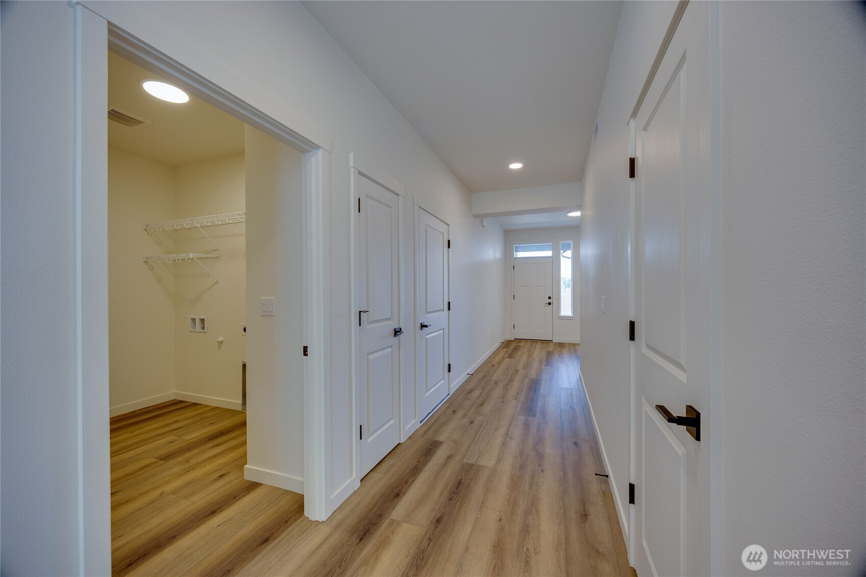 930 RW Fletcher Street Winlock, WA 98596 - Photo 15 of 40 a view of a hallway with wooden floor and staircase