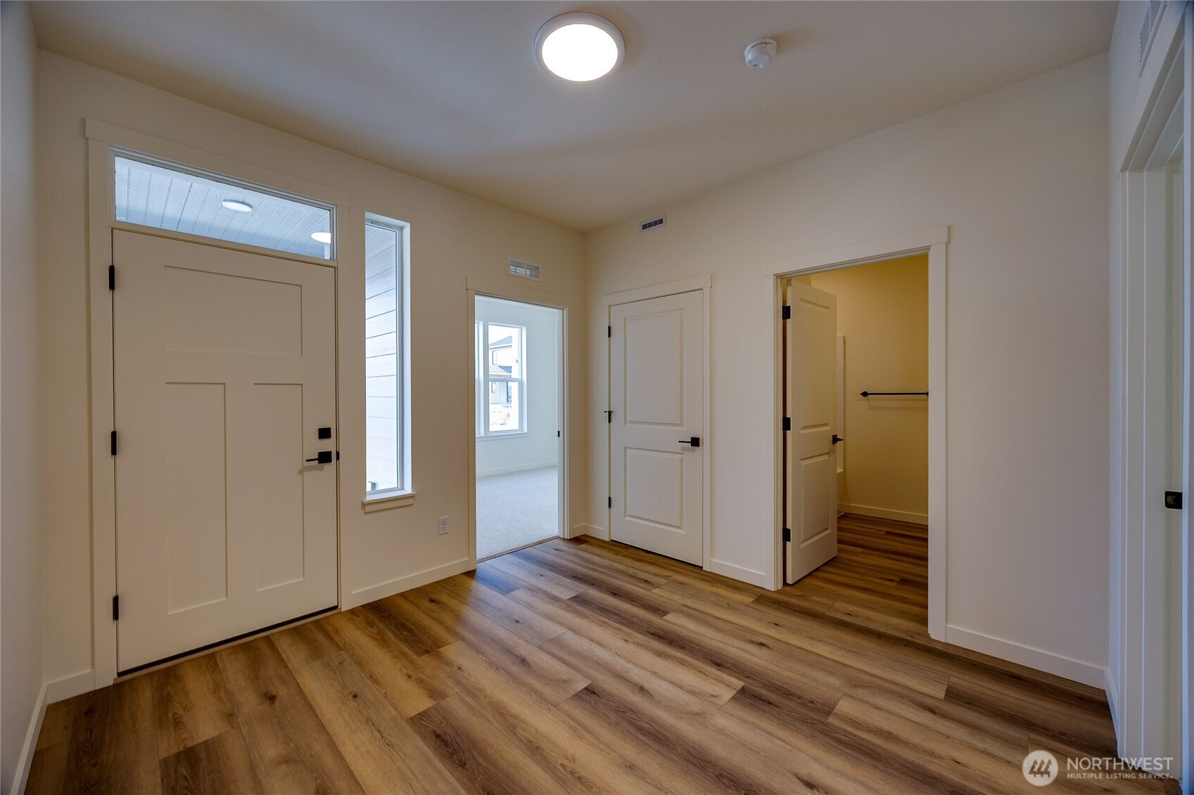 930 RW Fletcher Street Winlock, WA 98596 - Photo 5 of 40 a view of a livingroom with wooden floor and closet
