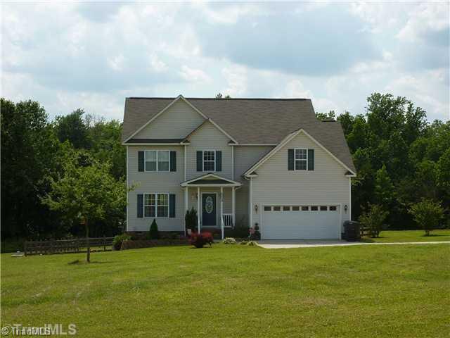 8059 Pritchett Road Browns Summit, NC 27214 - Photo 1 of 16 Exterior Front.