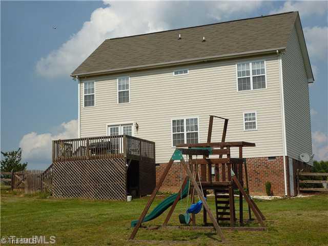 8059 Pritchett Road Browns Summit, NC 27214 - Photo 14 of 16 Exterior Back.