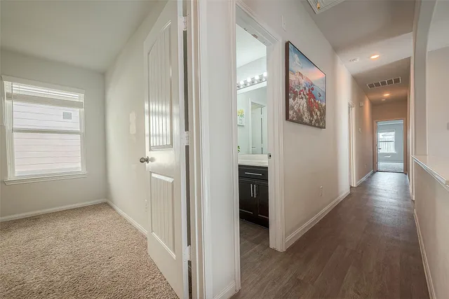a view of a hallway with interior of the house